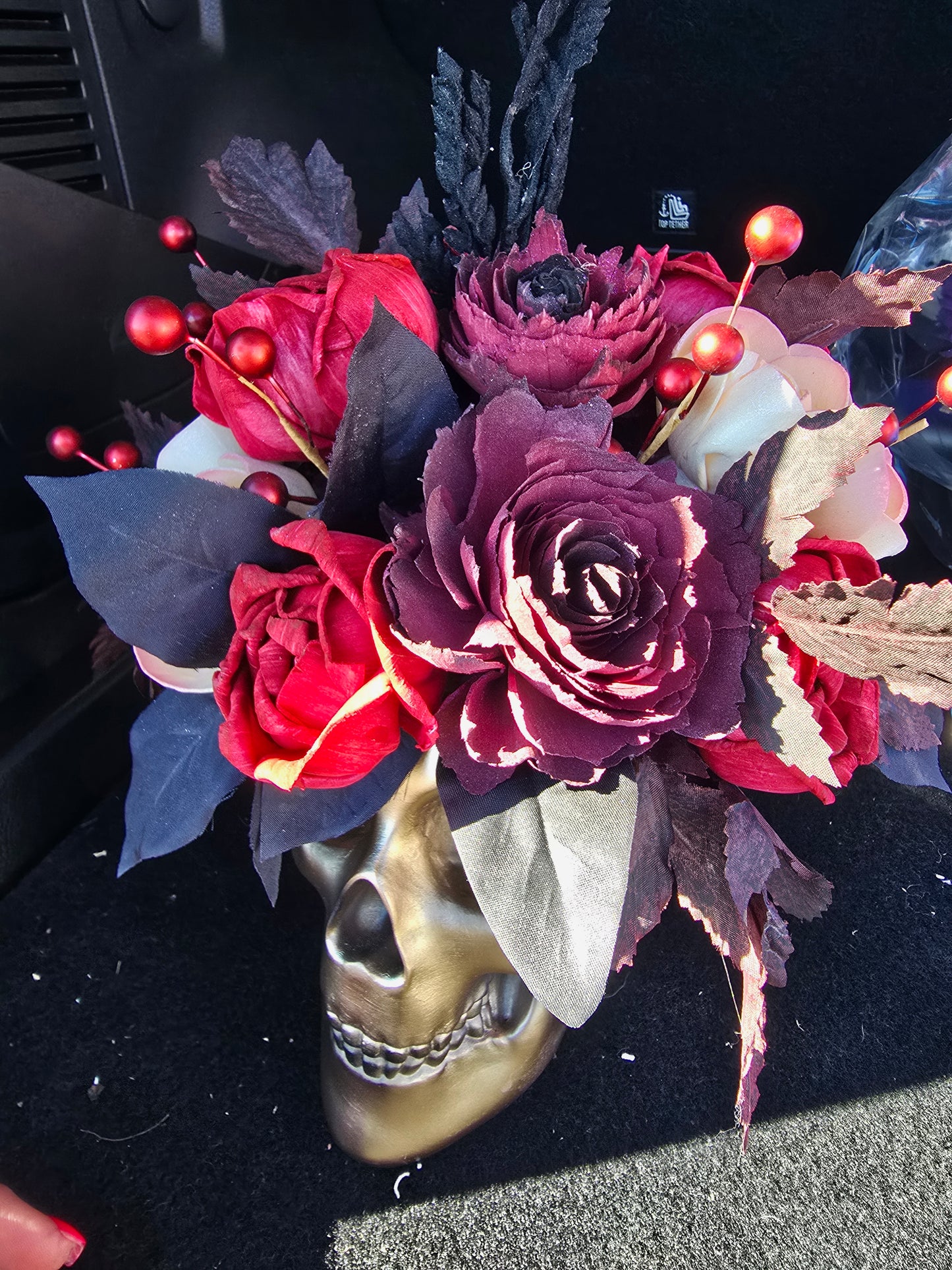 Gold Skull with Red, Black, and Champagne Roses